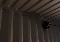 Speaker in a shipping container