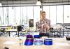 DXARTS' McMahon FabLab manager Derrick Van Kirk showing some 3d printed face masks (Dennis Wise/UW)