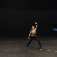 Image of performer Emily Schoen Branch wearing five motion tracker sensors, tracking wrist, hand, torso and ankles during the Research Lab