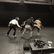 Four students from Drama class, performing improvisation excercises directed by Professor Adrienne Mackie
